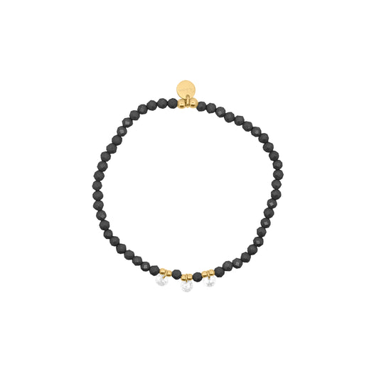 Bracciale elastico con zirconi milky neri e tre zirconi nudi bianchi pendenti al centro - GIPSY CHIC Rue des Mille