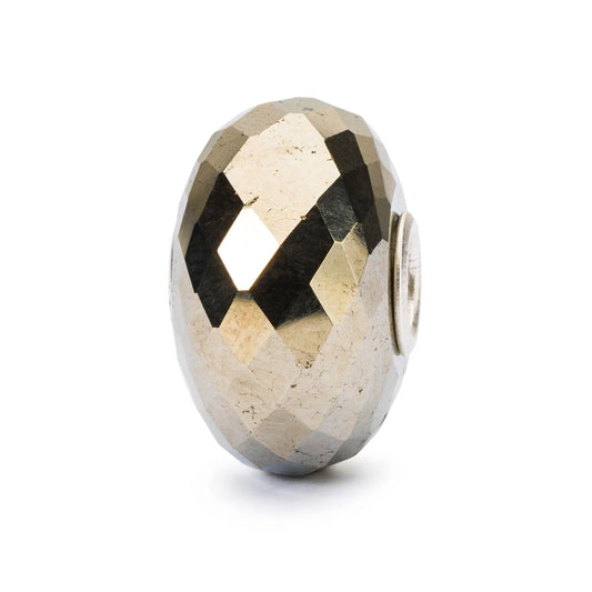La Pirite Trollbeads è una pietra naturale dorata e sfaccettata. | TSTBE-20029